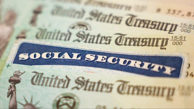 Studio shot of social security card and banknotes 